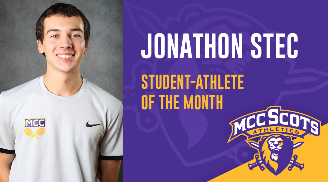 Jonathon Stec, February's student athlete of the month stands with arms folded behind him, smiling, wearing his MCC Tennis uniform shirt. 